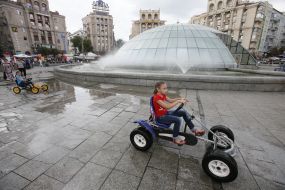Girl riding on a typewriter