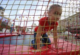 Girl jumping on a trampoline