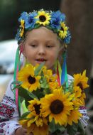 Children hold flowers