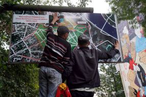 Workers install a buffer zone scheme