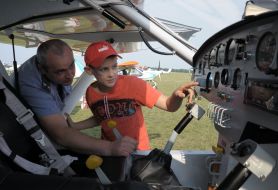 The boy with the instructor considered devices