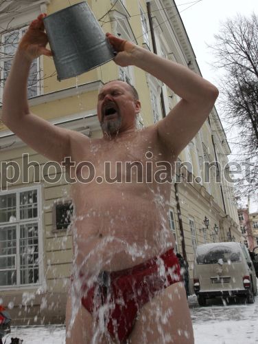 Photo Dousing With Cold Water Unian