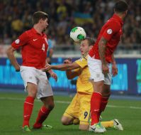 Oleg Gusev and Steven Gerrard