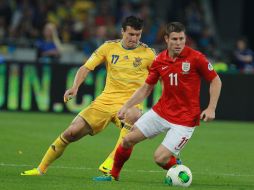 Artyom Fedetskiy and James Milner