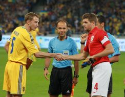 Oleksandr Kucher, Pedro Proenca and Steven Gerrard