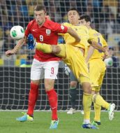 Yevgeniy Khacheridi and Ricki Lambert