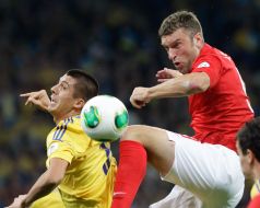 Yevgeniy Khacheridi and Ricki Lambert