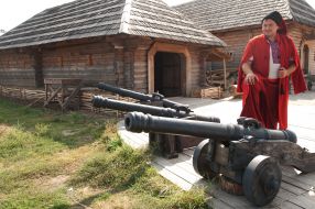 A man dressed as a Cossack gun shows