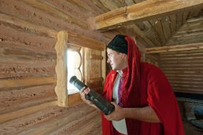 A man dressed as a Cossack gun shows