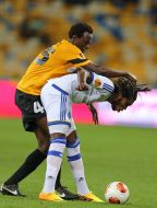 Dieumerci Mbokani and Bernard Kumordzi
