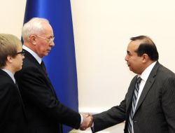 Nikolay Azarov and Turki bin Saud Mohammed A. Al-Suad
