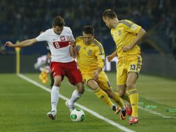 Evgeniy Konoplyanka, Vyacheslav Shevchuk and Grzegorz Kryhovyak