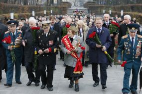 Participants of ceremony of laying-on of flowers