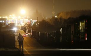 Trucks on the road side