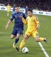 Yevgeniy Konoplyanka and  Mathieu Debuchy