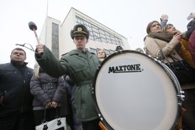 Soldier playing a large drum