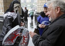 A participant of action in costume of death