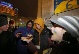 Girl gives sandwiches