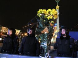 Bouquet of flowers in front of police officers
