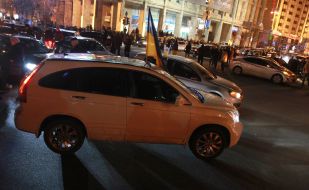 Cars block the passage