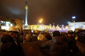 Participants of the rally fencing metallic shields Independence Square
