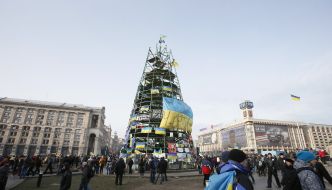 Flags of Ukraine on ferrous framework of new-year tree