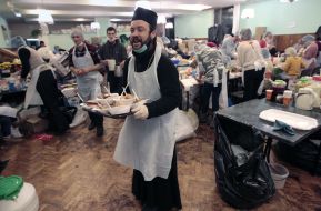 Priest on a kitchen of Euromaydan