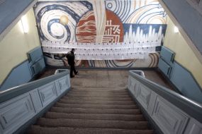 A man examines a list of candidates