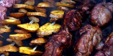 Potatoes and kebab on skewers