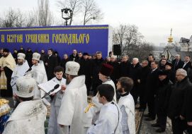 Priests lead consecrated water