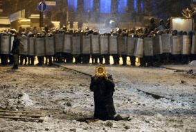 Priest and law enforcement at Hrushevskogo street in Kiev