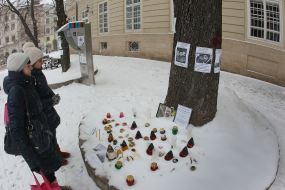 Girls stand near gravelights