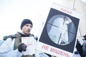 A rally in support of battered doctors