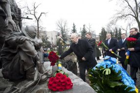 Participants of ceremony of laying-on of flowers