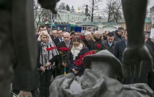 Participants of ceremony of laying-on of flowers