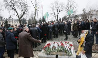 Participants of ceremony of laying-on of flowers