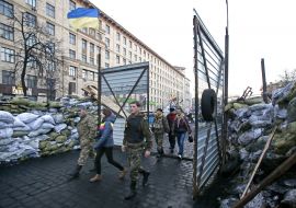 Protesters outside the metal gate