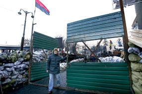 Protesters outside the metal gate