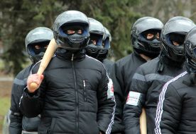Strangers with bats attack protesters