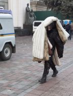 Law enforcement carries mattresses