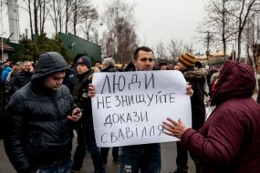 Activist holds a placard