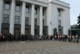 Women with the portraits of lost