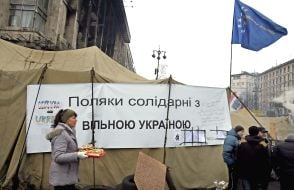 Woman carries sandwiches