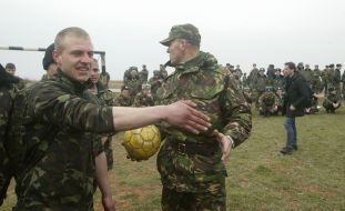 Soldiers play soccer at Belbek airdrom