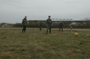 Soldiers play soccer at Belbek airdrom