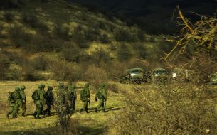 Servicemen block military unit