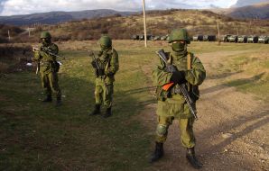 Servicemen block military unit