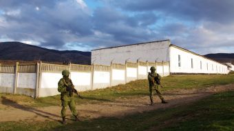 Servicemen block military unit