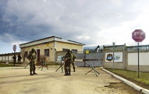 Servicemen block military unit
