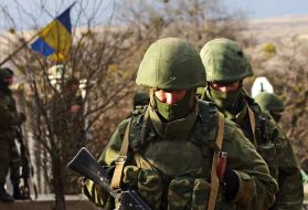 Servicemen block military unit